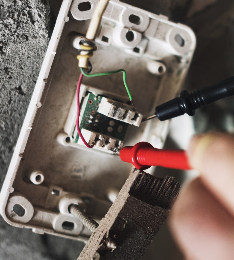 Circuit breaker replacements - Electrician working house repair installation.